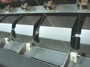 Hệ thống tra dầu sợi